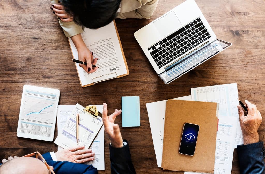 business-people-having-meeting - Cross-Connection Control & Backflow Prevention for Utilities - HydroCorp