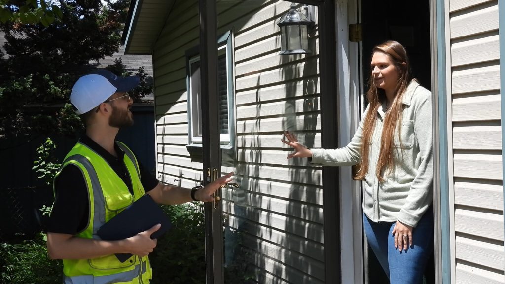 Inspector-at-Water-Customers-Door - Strengthening Public Confidence: The Value of Cross-Connection Control in Water Protection - HydroCorp - HydroCorp