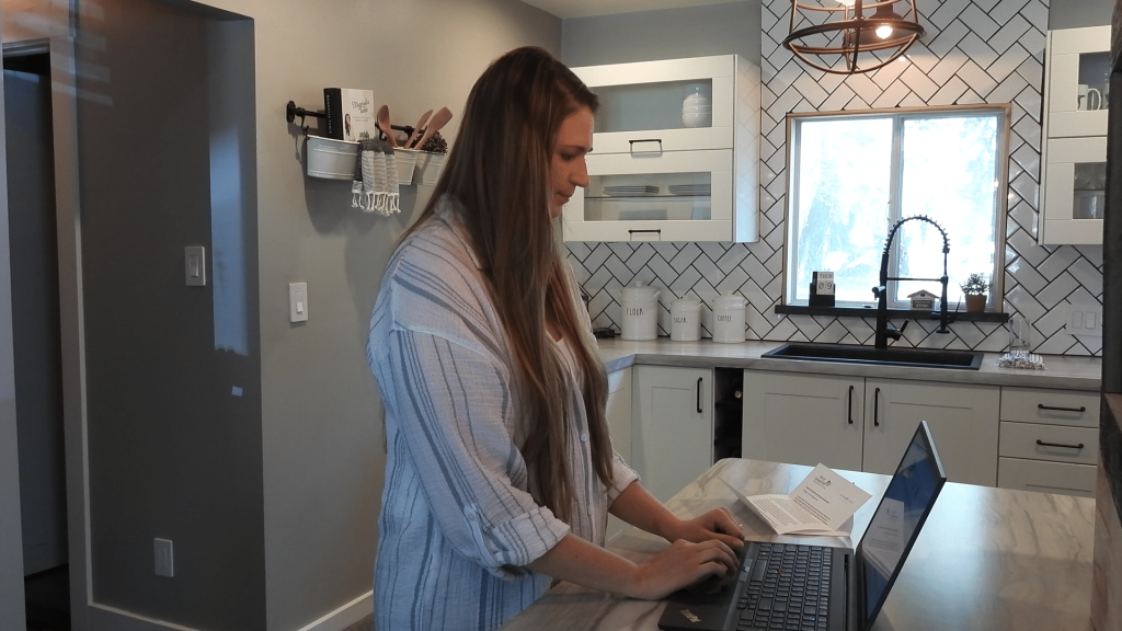 Residential-Water-Customer-at-Laptop - HydroCorp Residential-Water-Customer-at-Laptop - Dos and Don’ts for Cross-Connection Control and Backflow Public Awareness - HydroCorp - HydroCorp