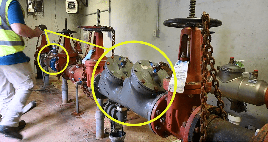 Watermarked-CCC-Inspector-at-1013-rpz-containment-900-PX-yellow-circle-1 - Double Your Water Service Line Inventory Efficiency - HydroCorp - HydroCorp