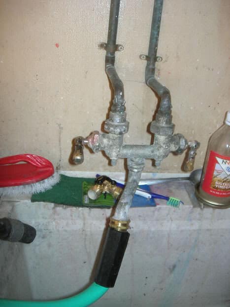 utility-sink-fixture-2-unprotected - 5 Connections Water Utility Staff Should Check in Their Own Homes - HydroCorp - HydroCorp